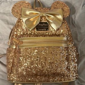 Disney parks rose gold Minnie Mouse lounge fly